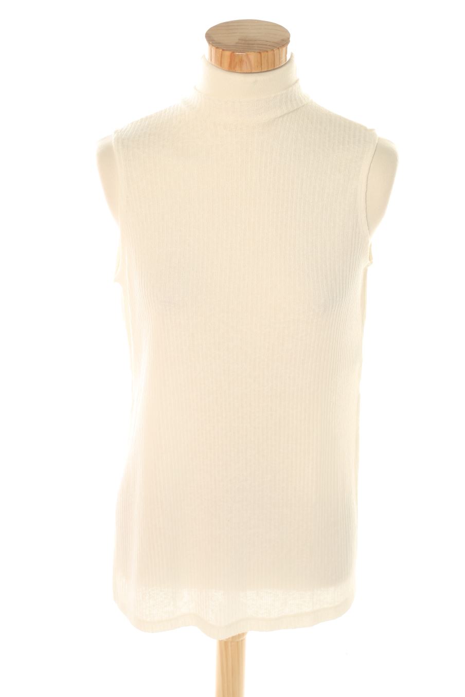 Top de H&M de la talla XS, de color beige