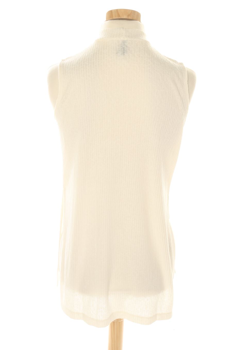 Top de H&M de la talla XS, de color beige