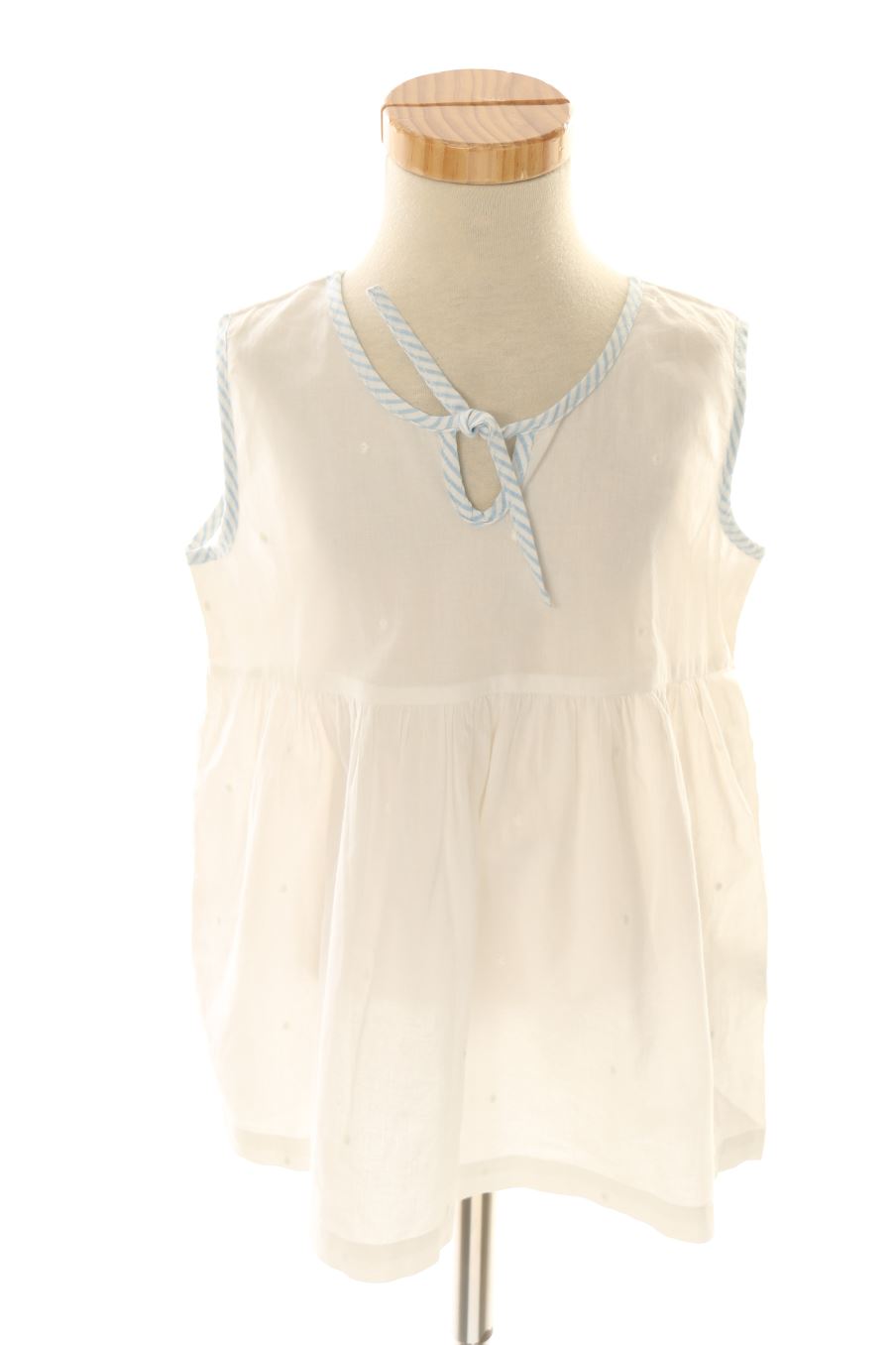 Top Cotton Juice de la taille 5 ans avec une étiquette