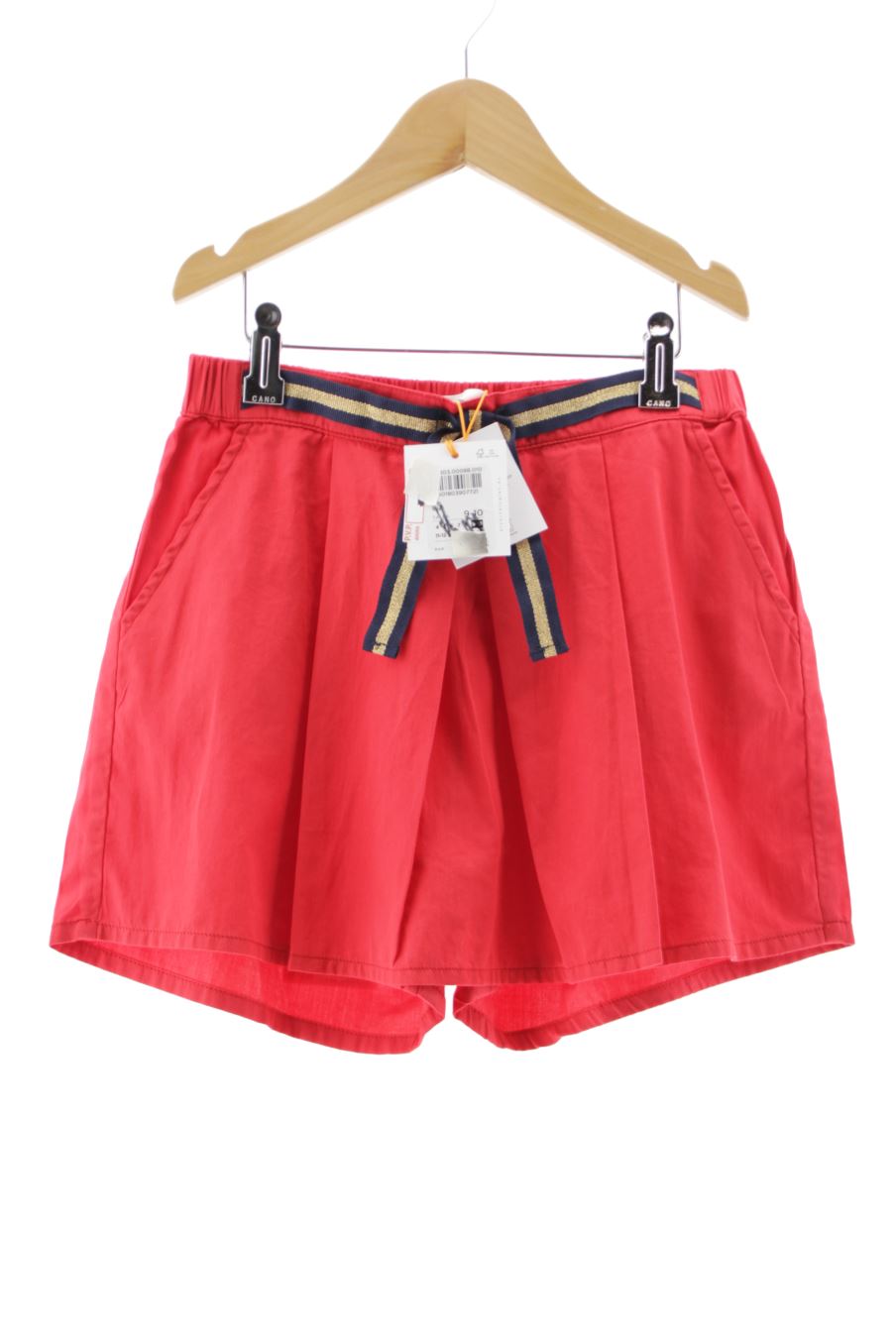 Short Kids collection (El Corte Inglés) de la taille 9 ans avec une étiquette