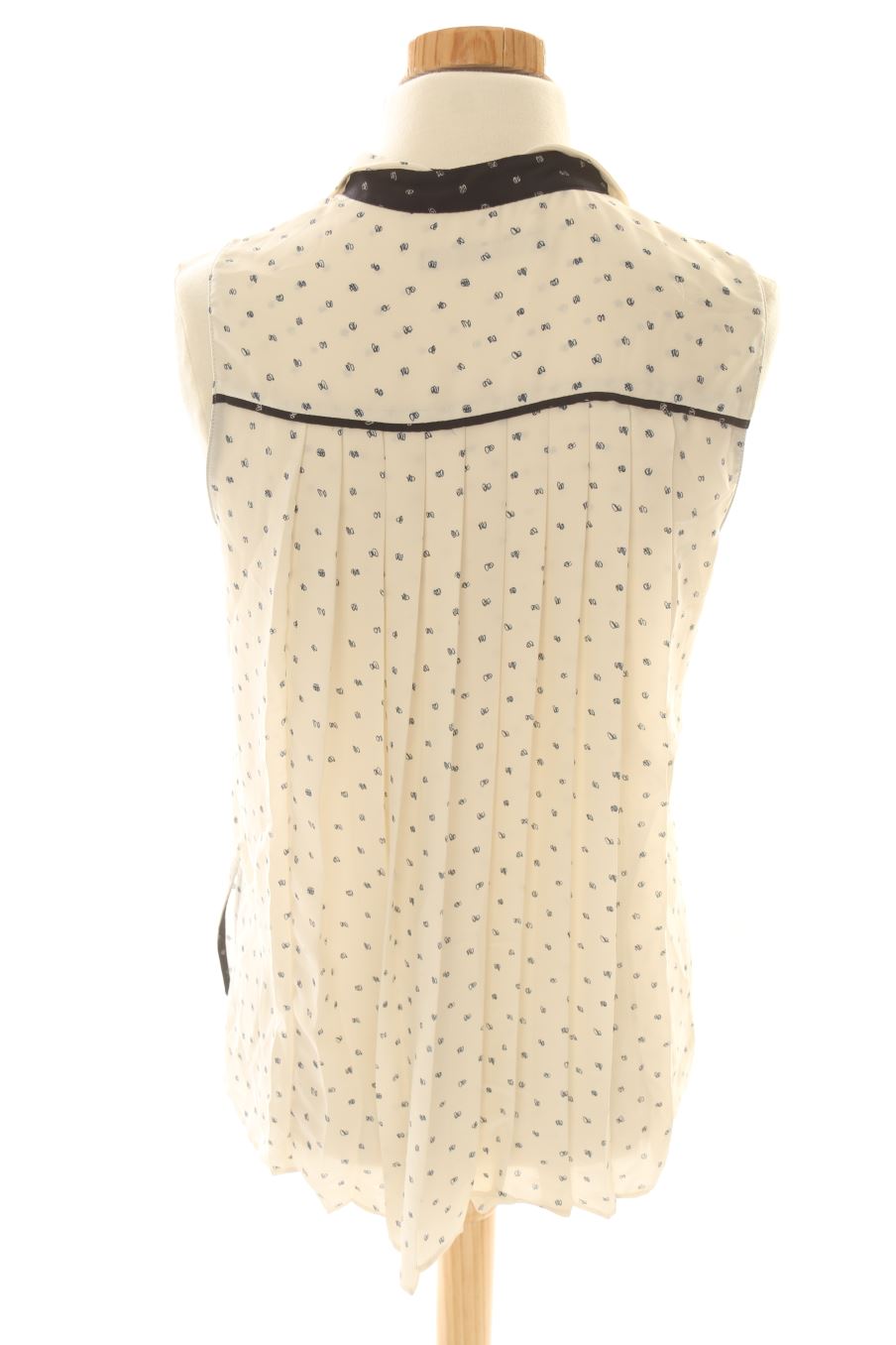 Camisa sin mangas de Zara de la talla XS, de color beige
