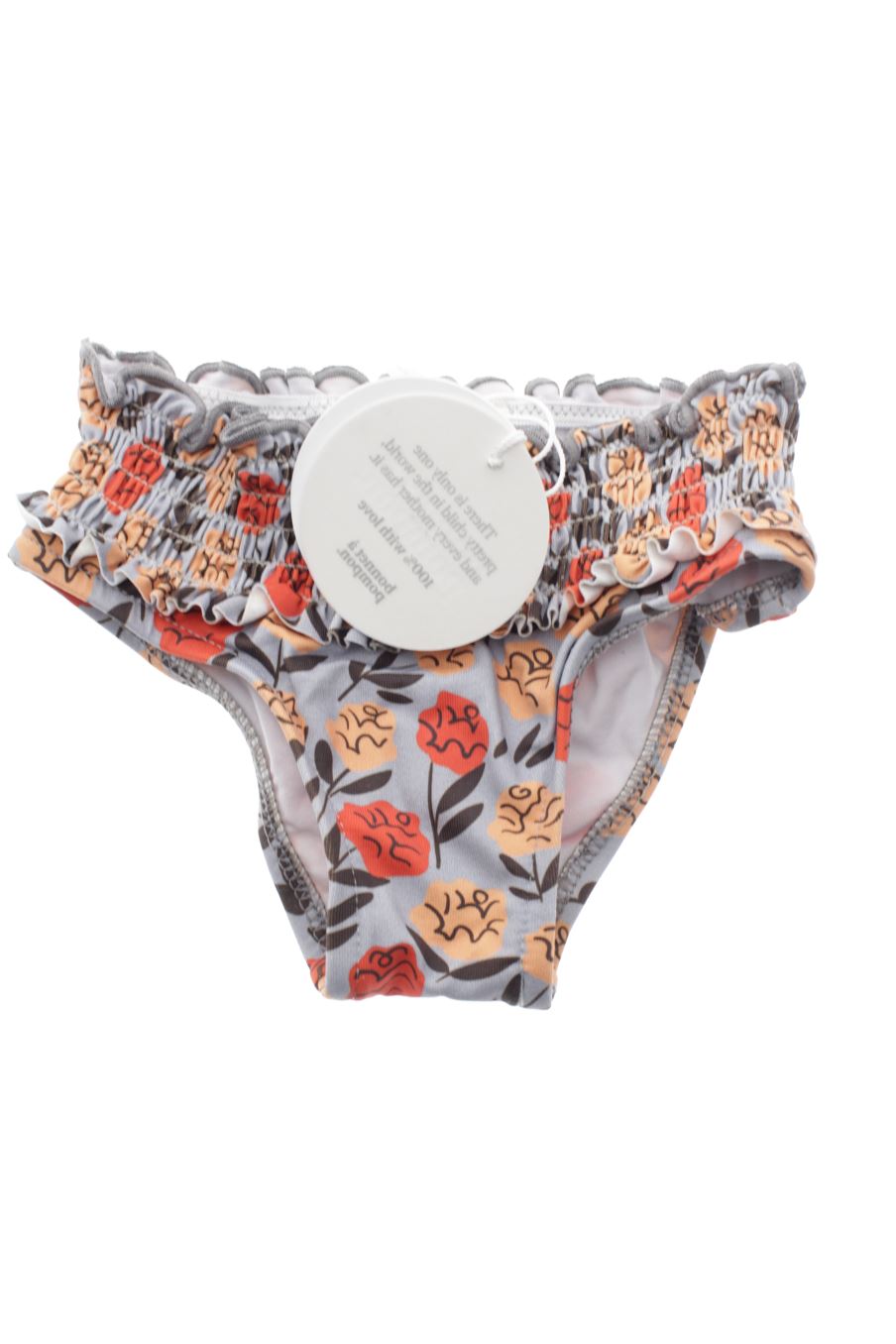 Maillot de bain Bonnet a Pompon de la taille 3 ans avec une étiquette