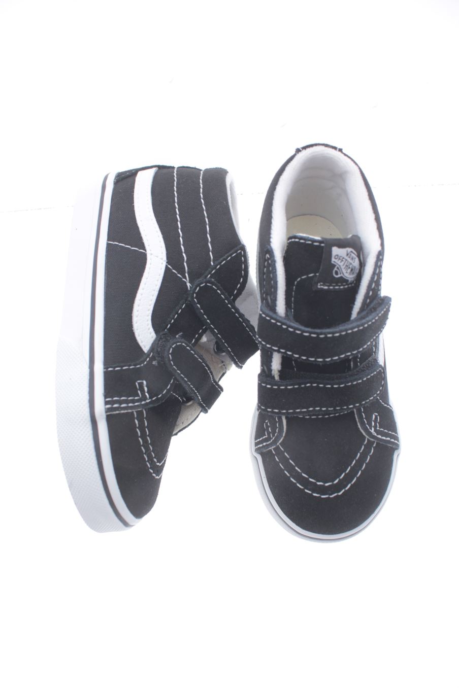 Chaussures de sport Vans de la taille 26 avec une étiquette