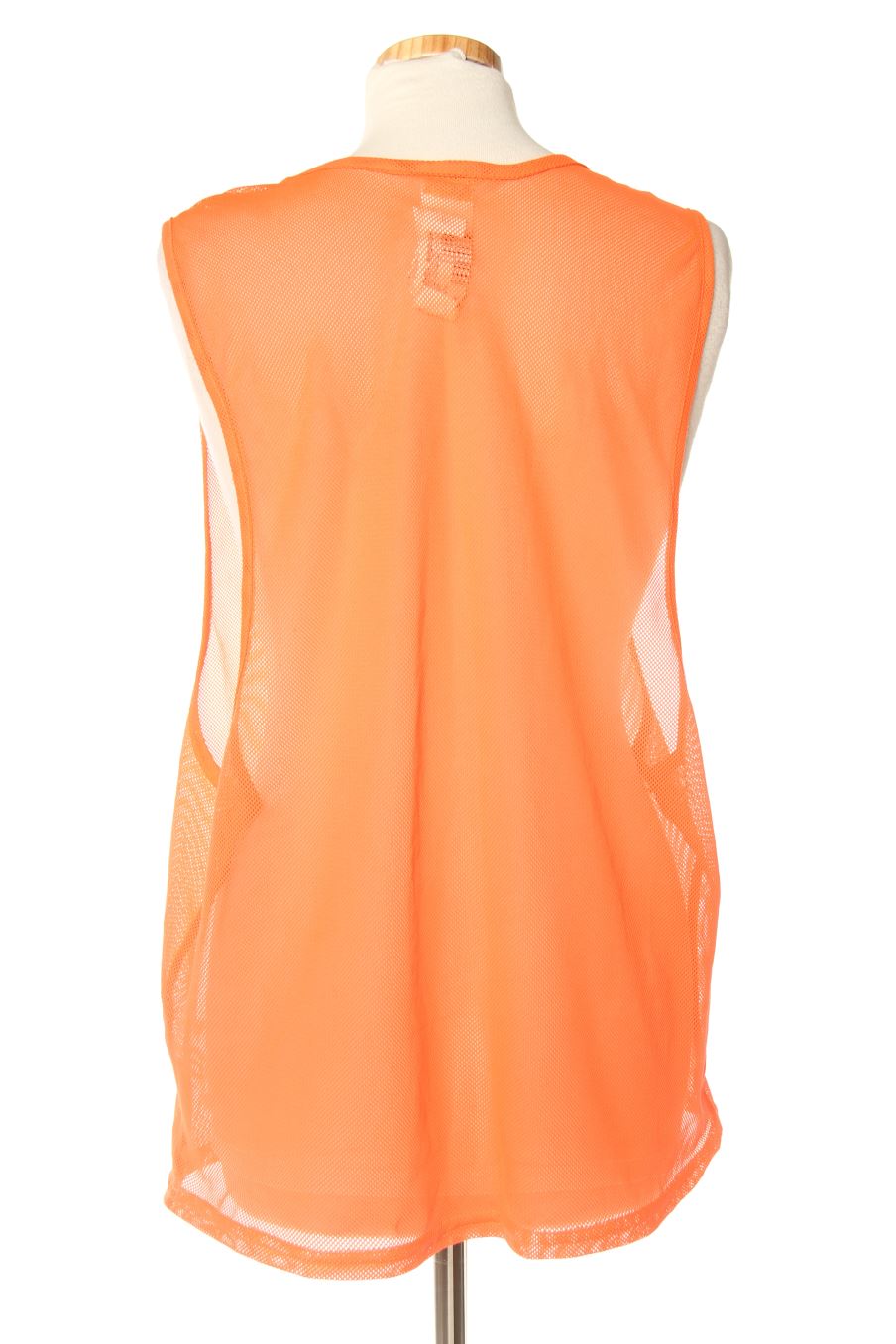 Top sport Kipsta (DECATHLON) de la taille Taille unique, de couleur orange