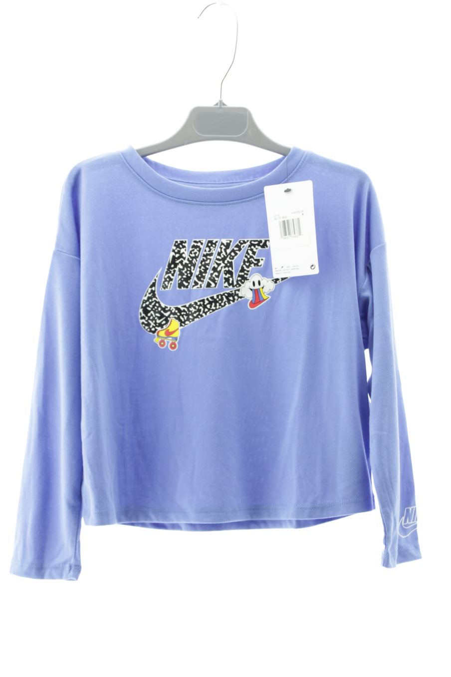 T-shirt manches longues Nike de la taille 4 ans avec une étiquette