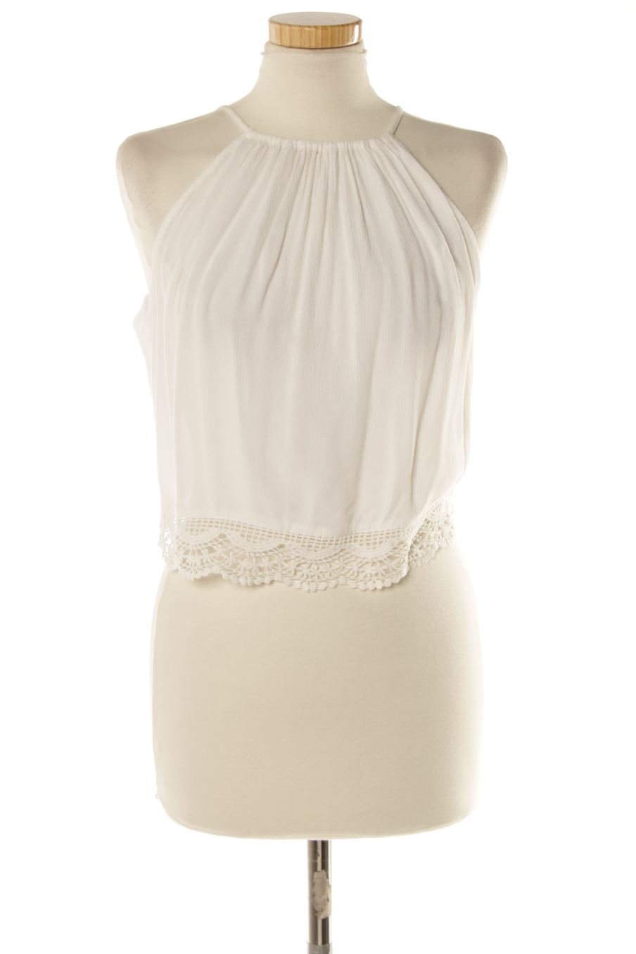 Top H&M de la taille 38, de couleur blanc