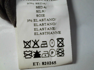 Blusa de manga larga de Carolina Herrera de la talla 42, de color gris