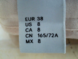 Pantalon H&M de la taille 38, de couleur beige