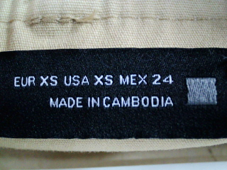 Pantalón de Zara de la talla XS, de color beige