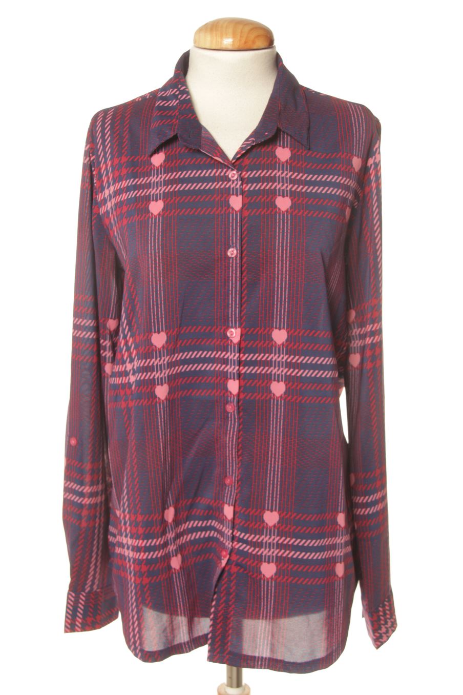 Chemise kling de la taille M, de couleur imprimés
