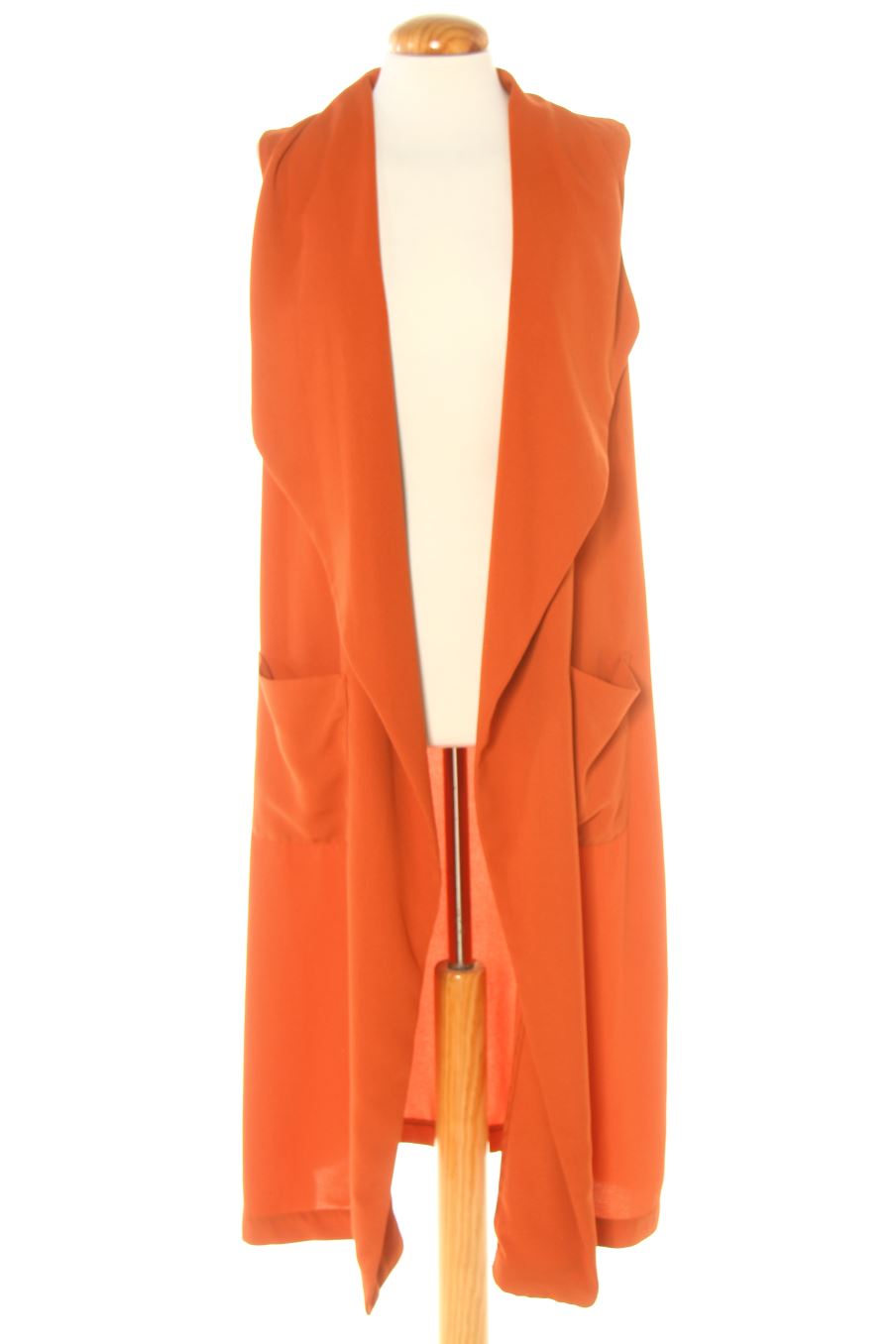 Chaleco de tela de H&M de la talla 36, de color marrón
