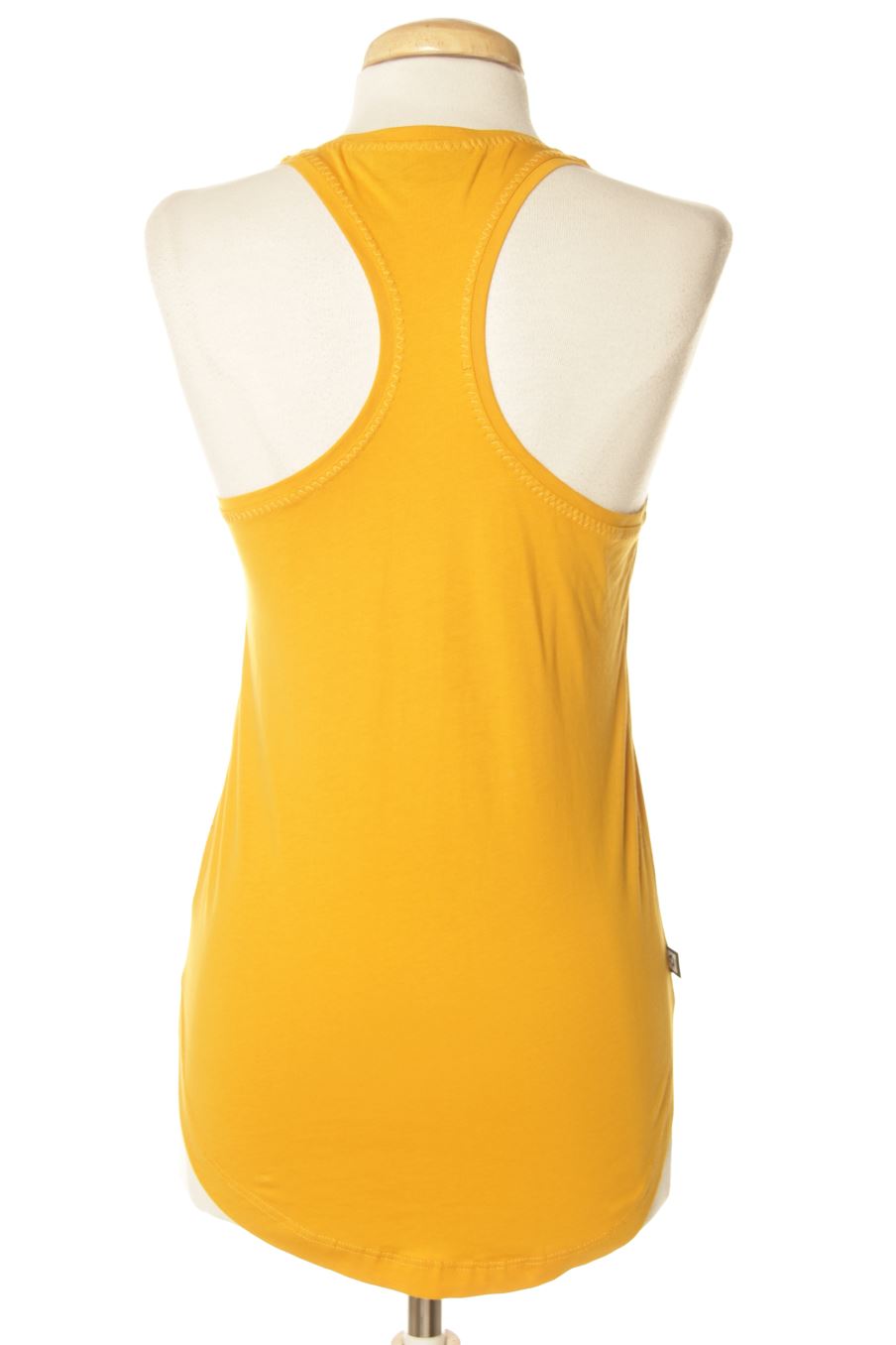 Top sport Mystic de la taille XS, de couleur moutarde