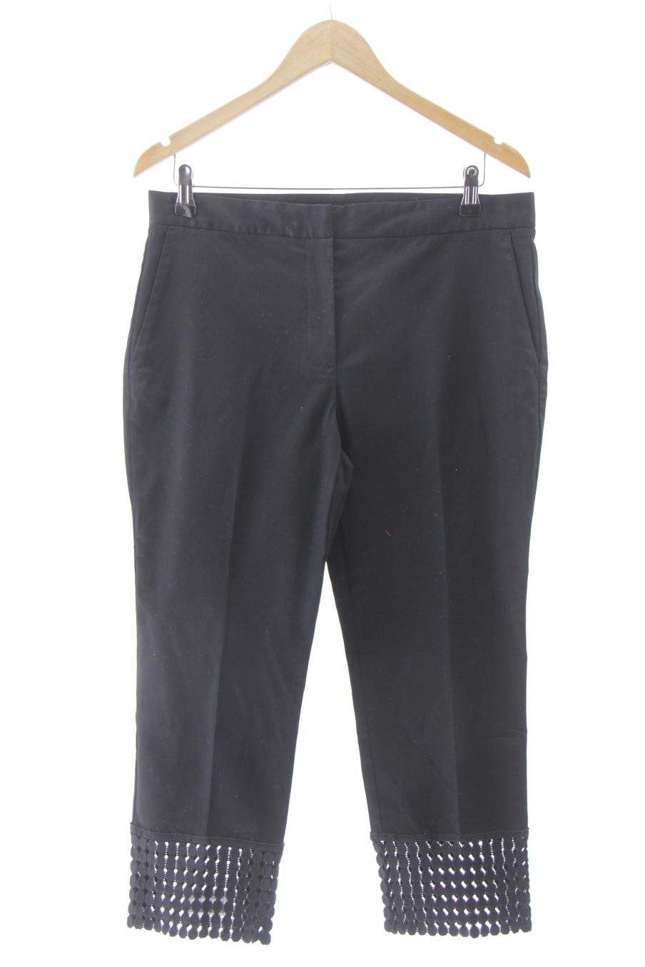 Pantalón de Zara de la talla L, de color negro