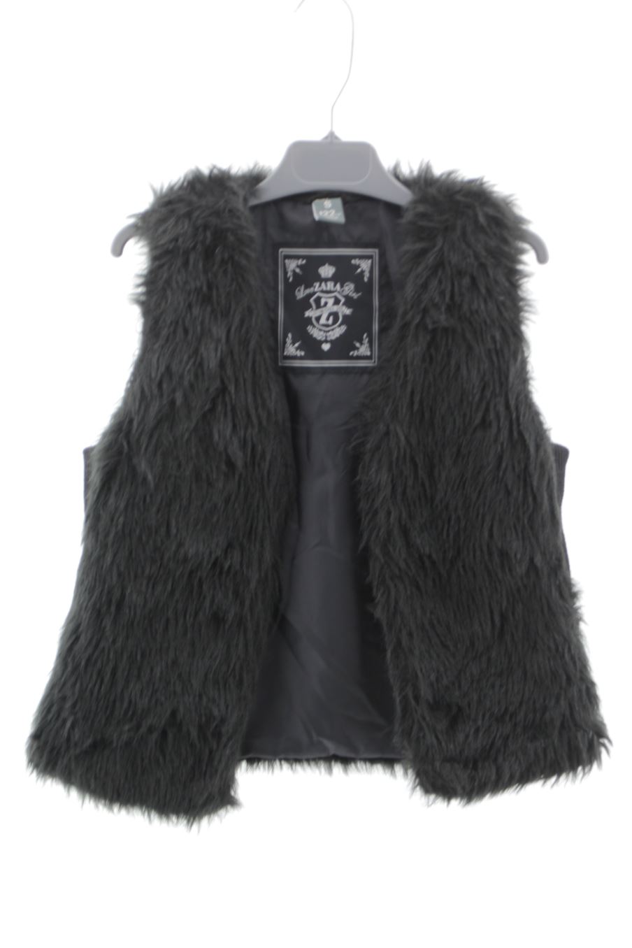 Chaleco de abrigo de Zara de la talla 7 años de segunda mano