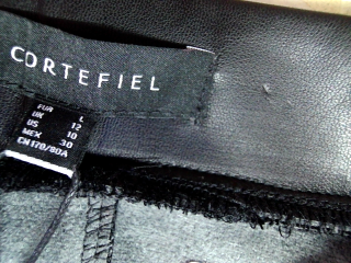 Falda de Cortefiel de la talla L, de color negro de sintético