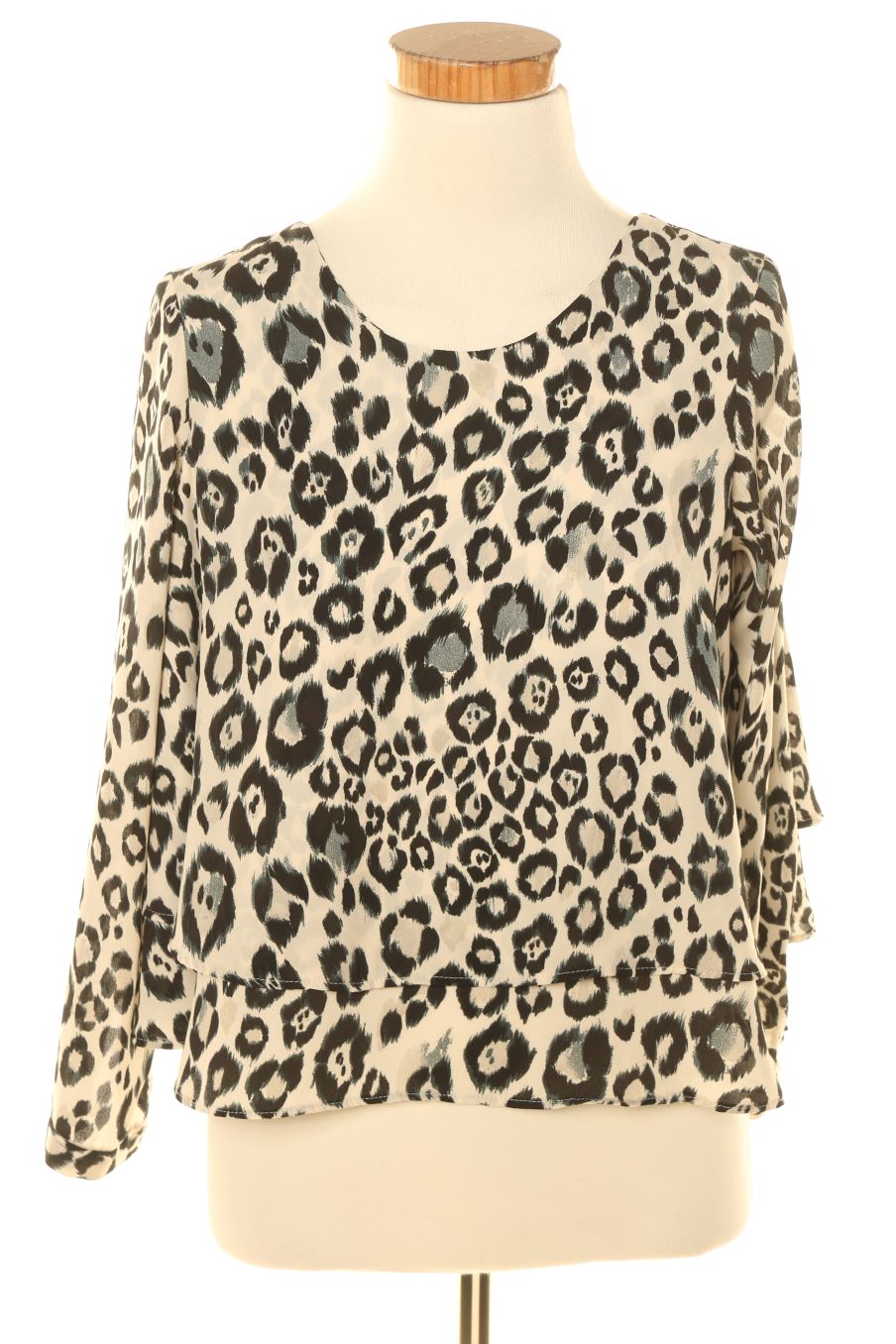 Blusa de manga larga de Zara de la talla XS, de color animal print