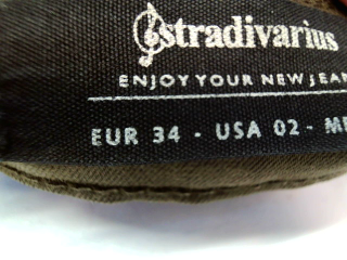 Jeans Stradivarius de la taille 34, de couleur vert de denim