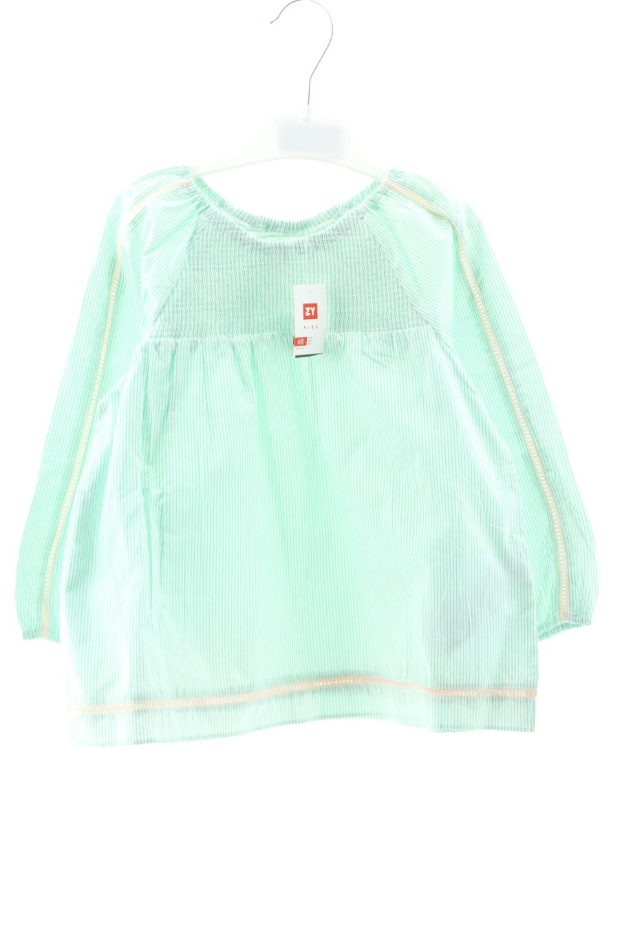 Blouse à manches longues ZY de la taille 4 ans avec une étiquette