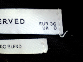Pantalon Reserved de la taille 36, de couleur noir