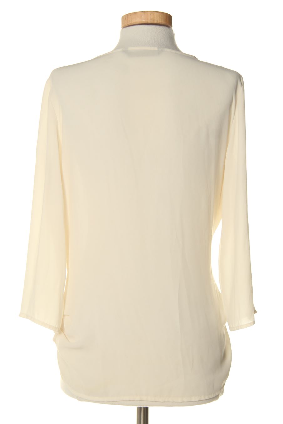 Blusa de manga larga de Zara de la talla XS, de color beige