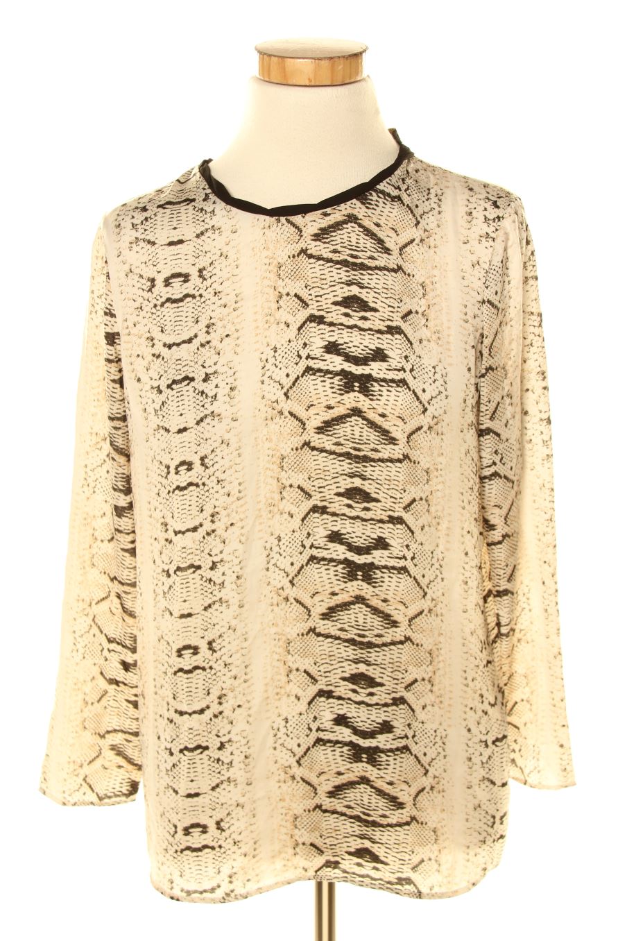 Blusa de manga larga de Zara de la talla S, de color animal print