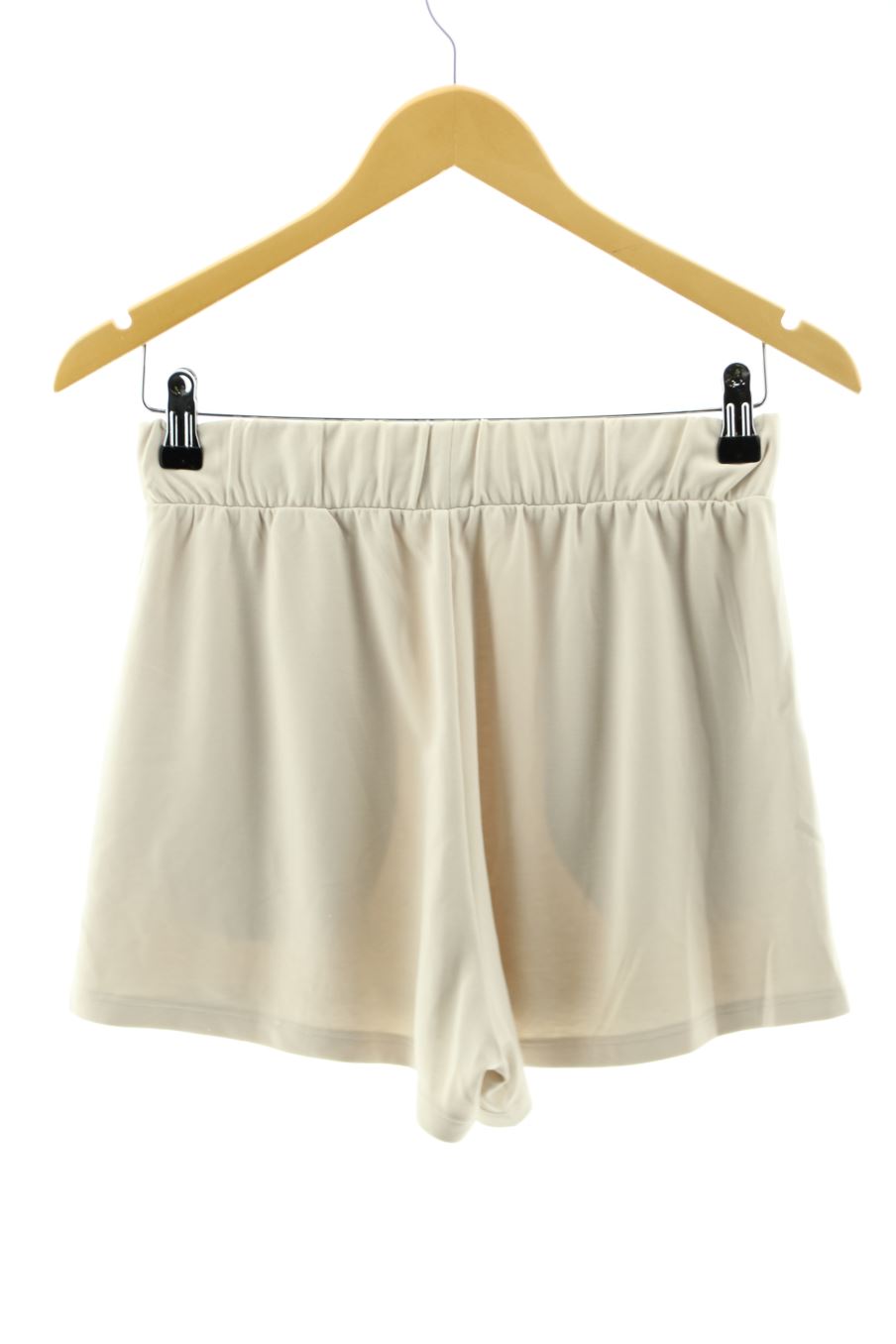 Pantalones cortos de deporte de MONKI de la talla XS, de color beige