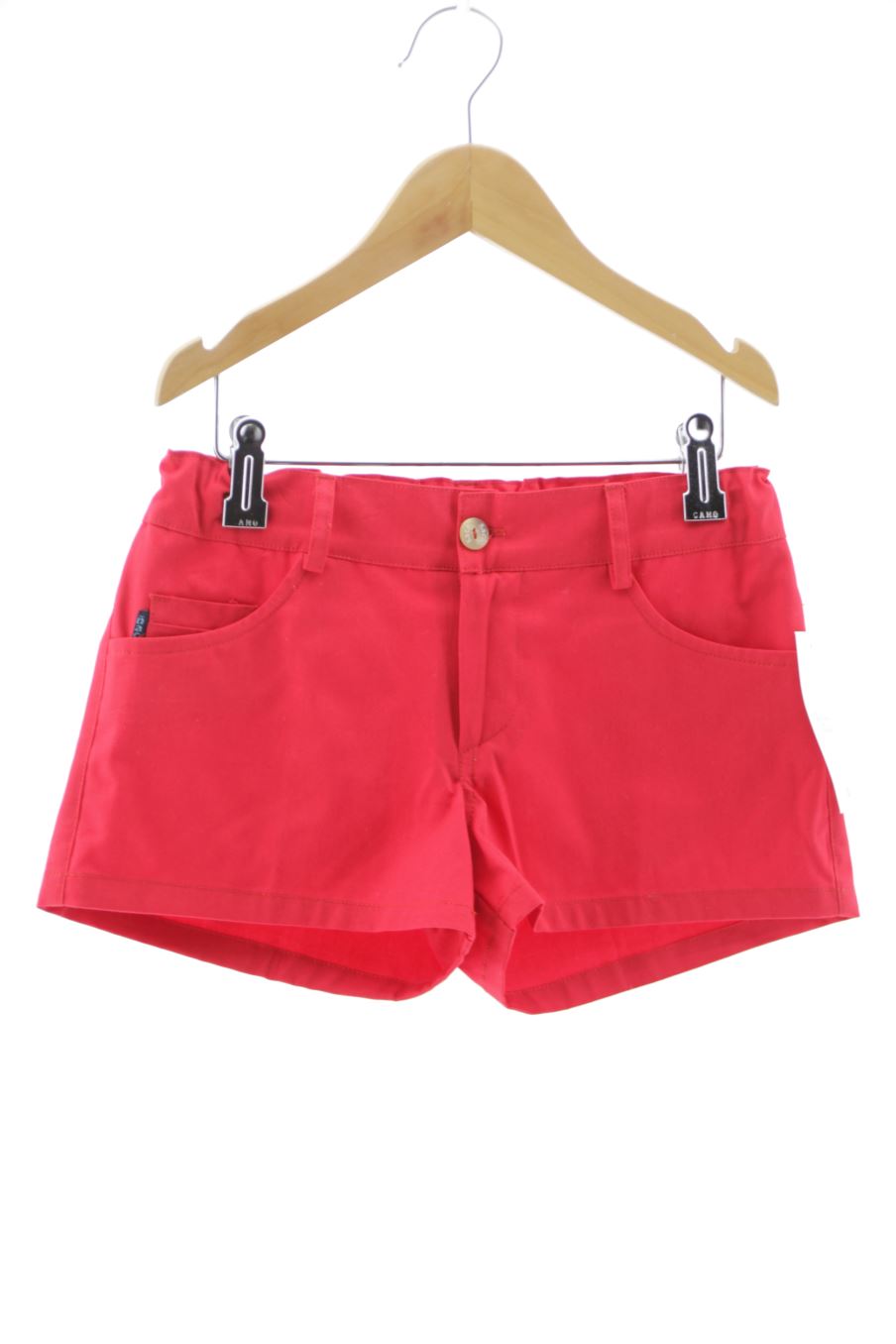 Short Ñaco de la taille 10 ans avec une étiquette
