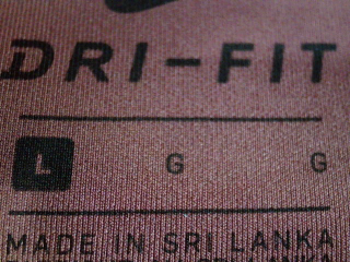 Pantalon de deporte de Nike de la talla L, de color marrón