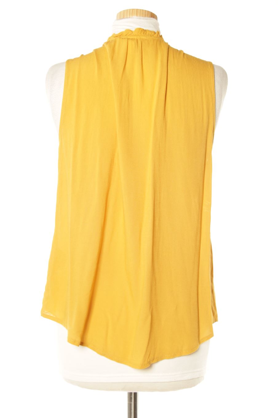 Camisa sin mangas de H&M de la talla 40, de color mostaza
