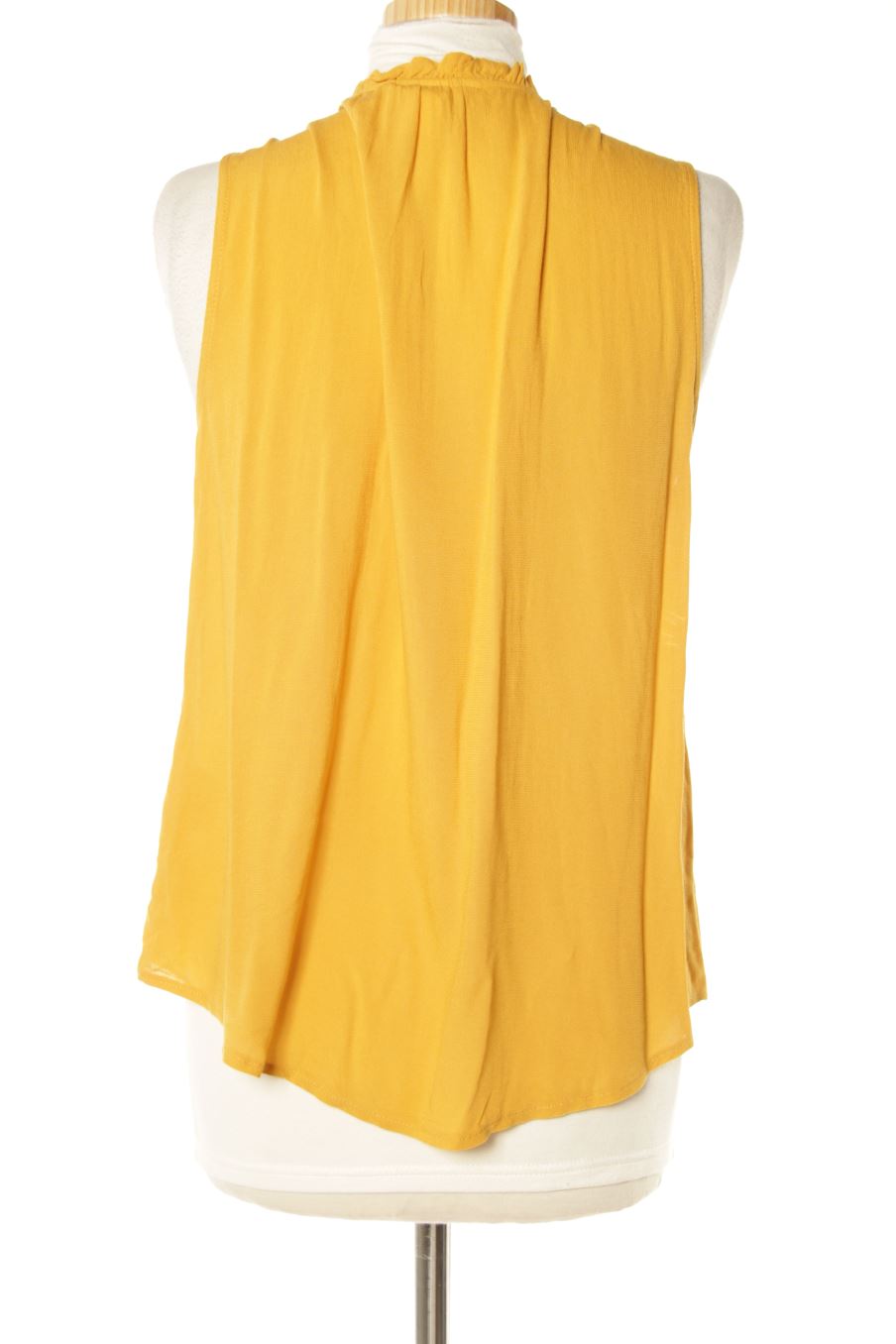 Camisa sin mangas de H&M de la talla 40, de color mostaza