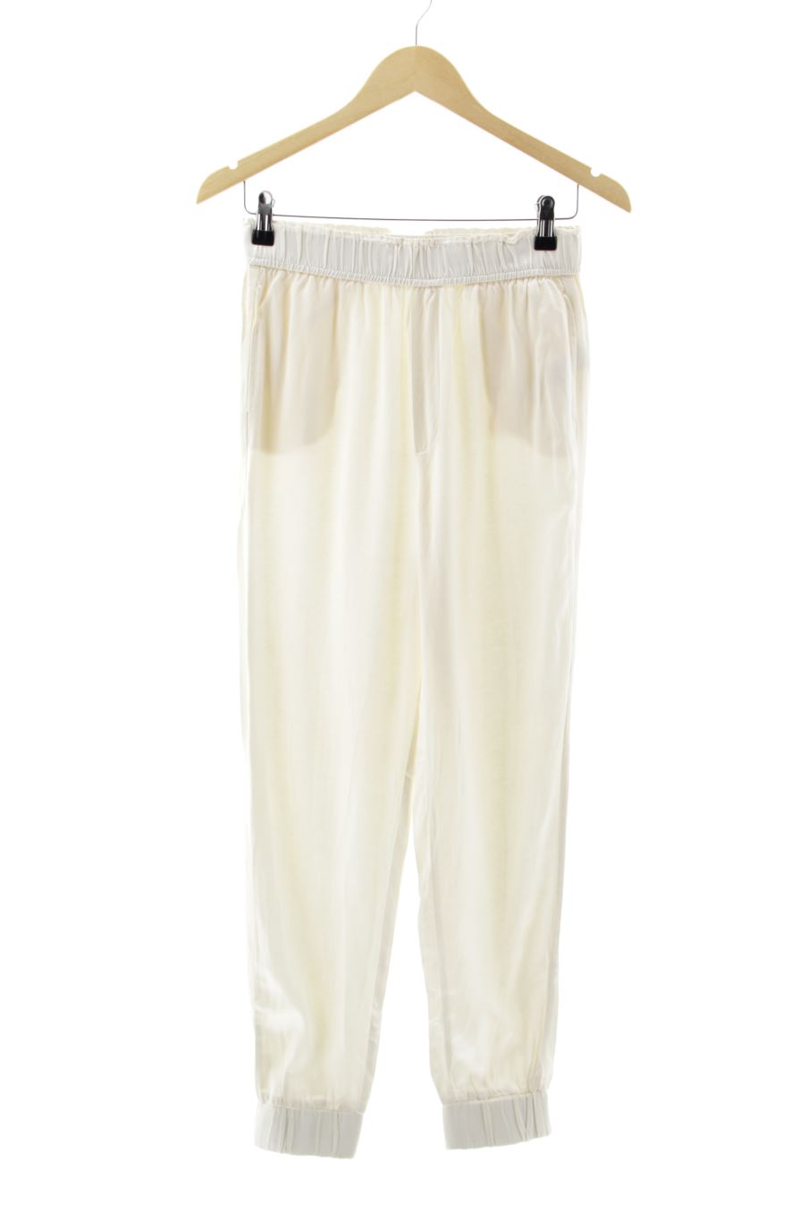 Pantalón de Zara de la talla XS, de color beige