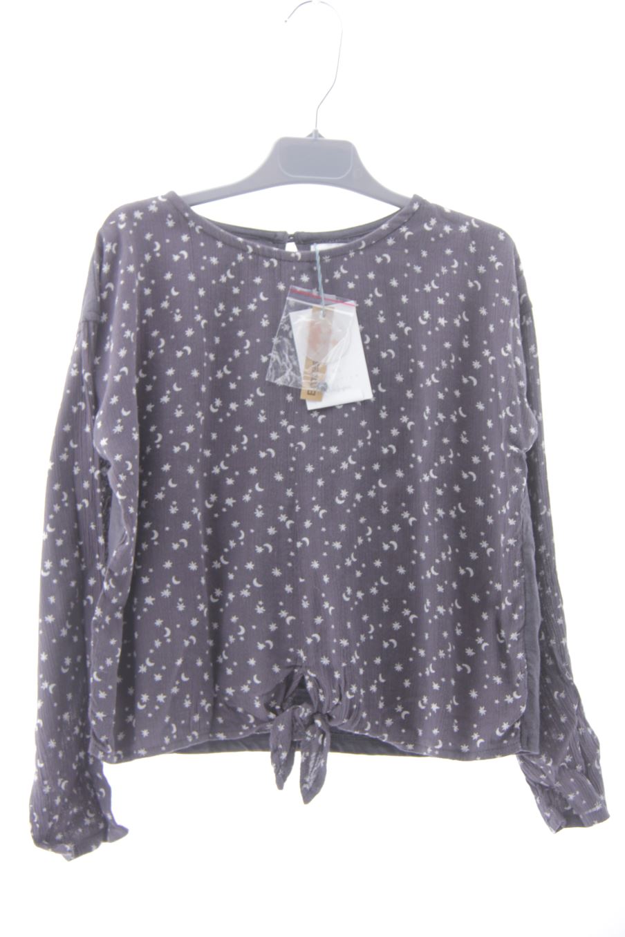Blouse à manches longues Kids de la taille 7 ans avec une étiquette