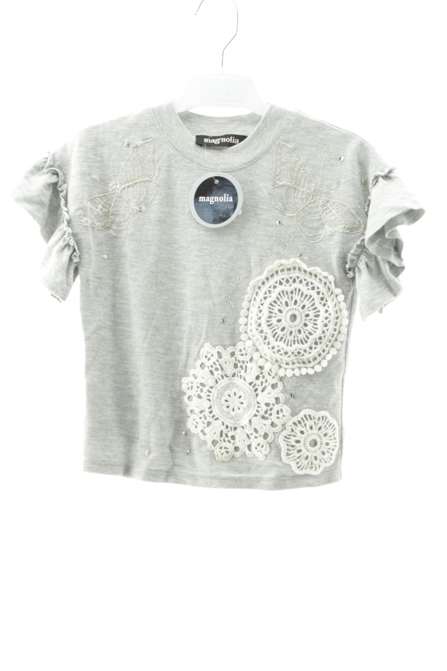 T-shirt Magnolia de la taille 6 ans avec une étiquette
