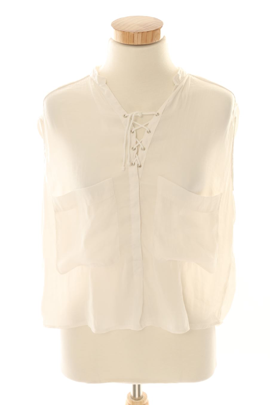 Camisa sin mangas de Trafaluc de la talla XS, de color blanco