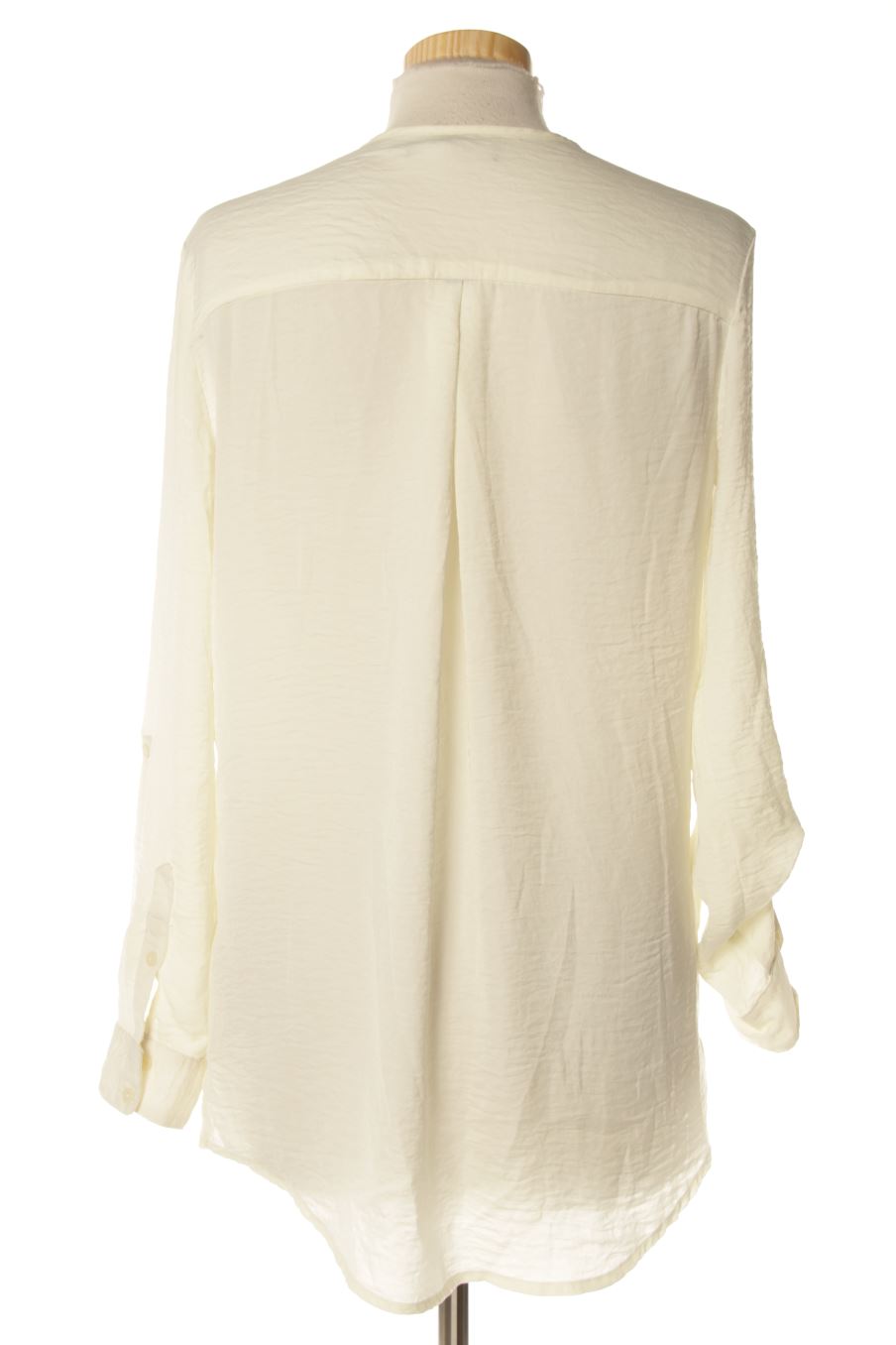 Blusa de manga larga de Mango de la talla XS, de color beige
