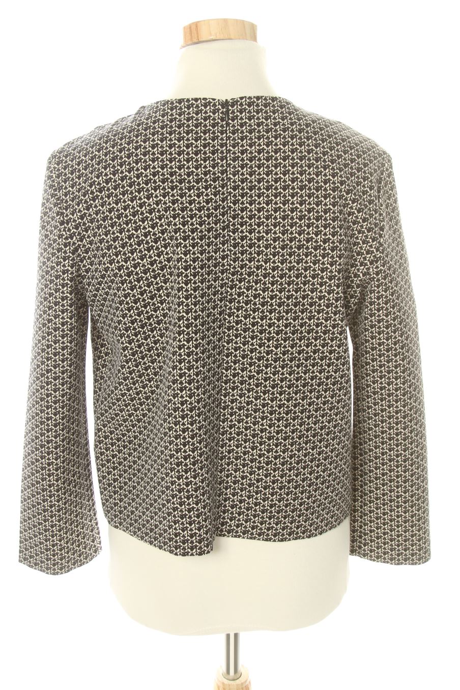 Blusa de manga larga de Zara de la talla M, de color negro
