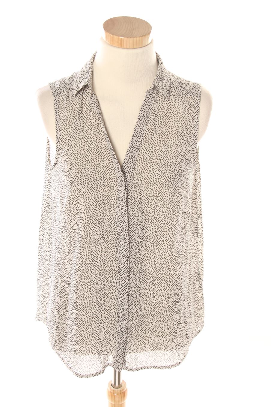 Camisa sin mangas de H&M de la talla 36, de color gris