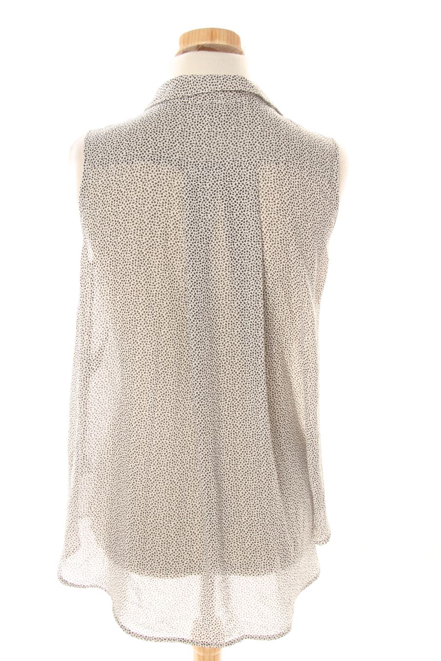 Camisa sin mangas de H&M de la talla 36, de color gris